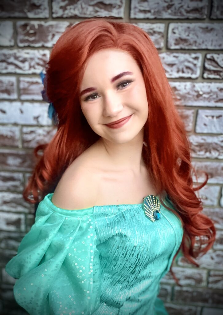 A lady dressed as Ariel